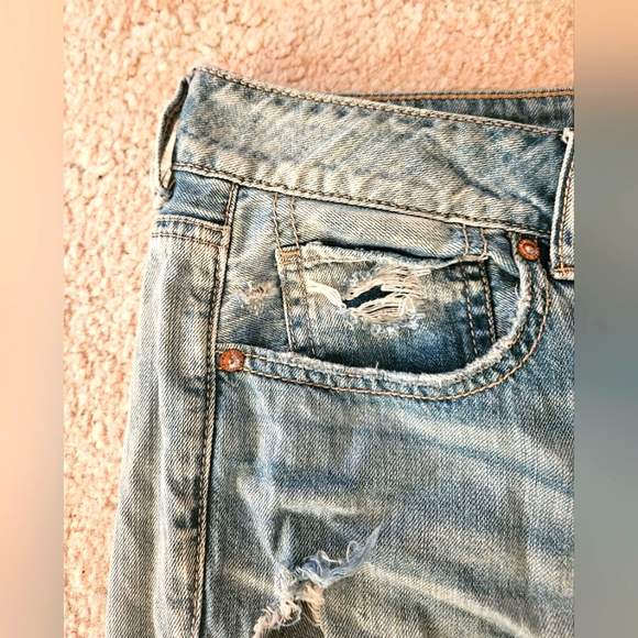 American Eagle Distressed Lightwash Jeans | Large Leg Holes - Picture 5 of 9